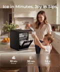 Mother and child using Nugget Ice Maker For Countertop With 44 Lb Per Day Capacity Self Cleaning Black Stainless Steel Portable Ice Machine in kitchen.