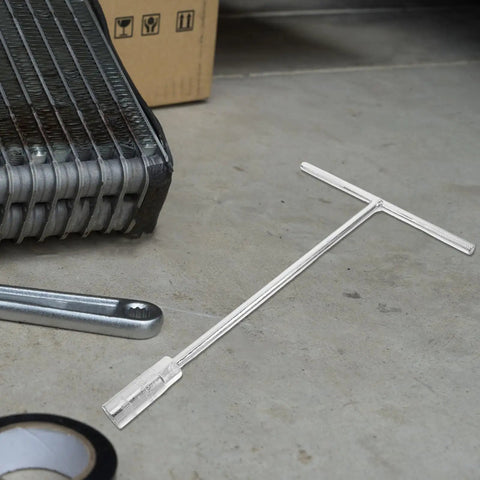 Heavy Duty T Handle Socket Wrench Set For Bike And Motorcycle Maintenance With Thick Hexagon Shaft and Slick No Slip Grip on garage floor.
