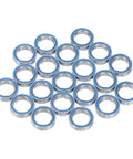 Premier Miniature Ball Bearings Stainless Steel Double Shielded 10X15X4 MM Pack Of 20 arranged in a flat layout for RC projects.