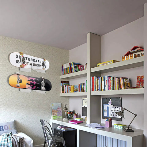 Acrylic skateboard wall mount displaying two boards in a stylish room setup; 4 Pack Premium Clear Acrylic Skateboard Wall Mount Racks Heavy Duty Display Hooks For Longboard Snowboard And Deck Gear Keep The Floor Clear Sick Room Setup.