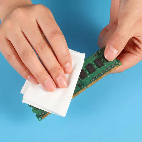Hands using Pro Grade Cleanroom Microfiber Wipes 100 Pack, Lint Free Disposable Lab Cloths on a semiconductor component.