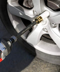 Foot/Pound Torque Limiting Extension Bar - Chrome Moly 1/2-Inch Drive 8-Inch Long Impact Grade Bar - Flex Action Prevents Over-Tightening - Color Coded for Easy Identification being used on a car wheel lug nut.
