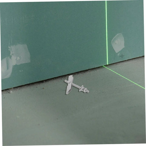 12 Piece Toggle Bolt Kit For Drywall And Brick Walls With Heavy Duty Carbon Steel Anchors displayed on a drywall surface