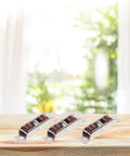 Slick Stainless Steel Sliding Door Roller Wheels With Hella Smooth Glide Dual Sash Pulley For Patio Replacement Hardware on a wooden surface.