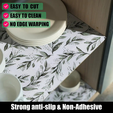 Top Shelf Non Adhesive Shelf Liners For Pantries Drawers And Closets With Nonslip Texture Durable Material Easy To Trim And Slide Into Place Every Single Time No Fuss Home Setup Game Changer, featuring floral design with plates and cups.