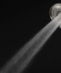 Kubos Exhilaration High Pressure Handheld Shower Head Matte Black Finish demonstrating strong water spray pattern against black backdrop.