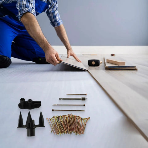 Person using Squeaky Floor Repair Kit With 250 Screws And Alignment Tools For Hardwood, Softwood, Vinyl, And Carpeted Floors, Quiet Floors No Creaks, Complete DIY Floor Fix For Pro Results on wooden flooring installation.