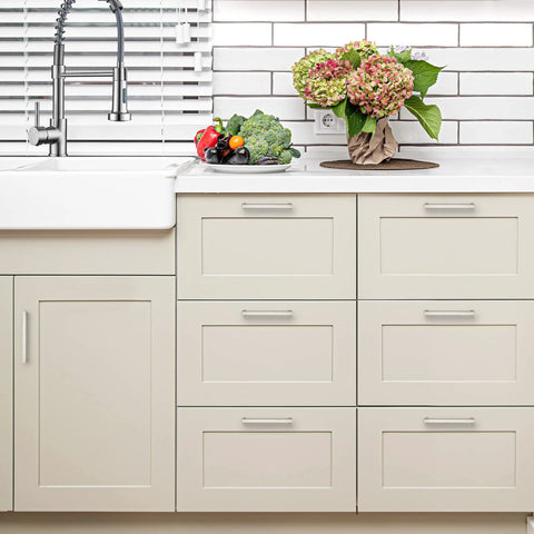 Kitchen cabinets with satin nickel handles, showcasing Ten Pack Six And A Quarter Inch Square Kitchen Cabinet Handles In Satin Nickel Finish