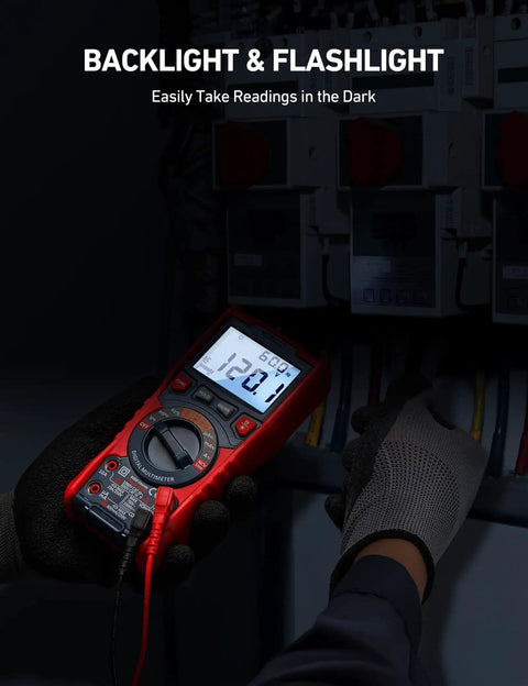 Person using True RMS 6000 Counts Auto Ranging Digital Multimeter with backlight, reading voltage on electrical panel in dark environment