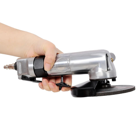 5 Inch Pneumatic Angle Grinder Built Different With Quick Air Hookup And 11000 RPM Power To Handle Your Daily Grind Crushing Steel And Iron Jobs In Any Workshop Or Garage Space, held in hand.