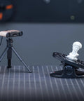 Dead On Accurate Dual Axis Turntable For Seamless 3D Scanner Accessory showing a white statue on a black platform and scanning device.
