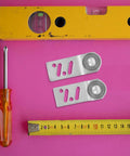 Top Shelf 4 Pc Stainless Steel Bearing Pulleys For Sliding Wardrobe Doors With 23 mm Axle on measuring tape and tools.