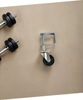 Badass 4 Inch Rubber Gate Wheel Caster Featuring An Adjustable Spring Bracket, showcasing durable rubber tread and metal bracket.