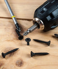 Black Self Tapping Wood Screws Kit With 420 Pieces Zinc Coated Carbon Steel Phillips Flat Head Assorted Sizes on wooden surface