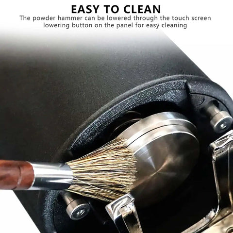 Game Changing 58Mm Automatic Espresso Tamper Machine With Touch Screen Dial And Adjustable Pressure For Hassle Free Coffee Puck Compaction In Tough Stainless Steel with cleaning brush detail.