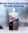 Clorox Screen+ Sanitizing Wipes canister on table with bleach-free cleaning text