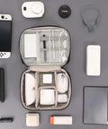 Heavy Duty Badass Electronics Organizer Bag For Travel Cables Chargers Power Bank Cell Phone Gear Hauler with organized tech accessories.
