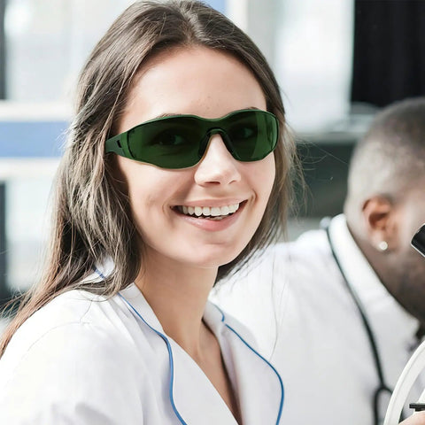 Smiling woman wearing Heavy Duty Laser Safety Glasses Beast Mode OD4 Eye Protection blocking UV and green lasers.