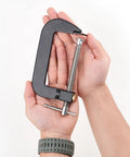 Beefy Fast Release 4 Inch G Clamp For Workshop Projects, Steel With Anti Rust Finish, Quick Slide Jaw For Easy Adjustments, Trapezoidal Thread For Strong Holding Power, Heavy Duty Woodworking And Metalworking Clamp held in hands