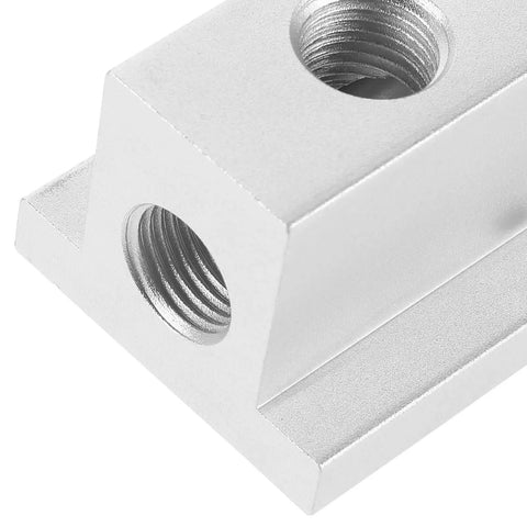 Close-up of silver T-Type Pneumatic Air Distribution Block 2-Position 4-Port Compact Gas Manifold showing threaded port