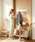 Premium Heavy Duty Self Adhesive Coat Rack Wall Mount Featuring Seven Robust Hooks For A Total Breeze Entryway Organization Dorm Room Key Holder Storage Rack in a modern hallway with mother and daughter.