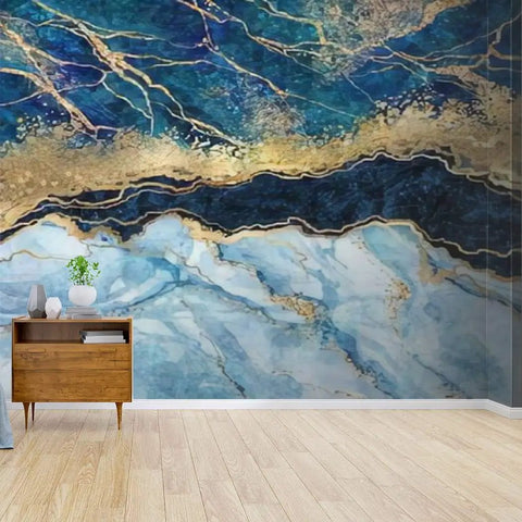 144 Inch By 100 Inch Self Adhesive Wallpaper Roll In Blue Marble Abstract Stone Texture With Dope Gold Accents Peel And Stick Waterproof PVC Wall Mural For Living Room Bedroom Bathroom Home Decor, displayed on wall behind wooden furniture.