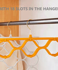 Foldable Scarf Organizer Rack With 18 Slots For Closet Storage And Necktie Display, bright orange hanging on closet rod.