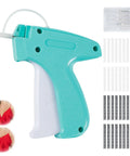 Slick Mini Tagging Gun For Apparel Repair And Crafting This Reliable Clothes Stapler with six needles and clips in teal color.