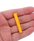 Close-up of hand holding a single yellow plastic wall anchor from the Yellow Plastic Wall Anchors Kit, 200 Pcs Self Drilling Drywall Plugs for Hollow Walls.
