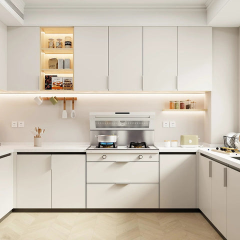 Modern kitchen with white cabinets and sleek design, featuring a clean countertop and under-cabinet lighting for a minimalist look.