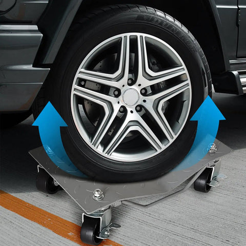 Built Tough Wheel Roller Set Of Four pushes up to 6000 lbs, heavy-duty steel tire dolly under SUV tire on smooth surface.