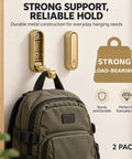 Big Shot Heavy Duty Foldable Wall Hooks Built From Tough Zinc Alloy Featuring A Clean Gold Tone for backpack hanging with strong support.