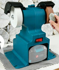 Tough Guy Mini Bench Grinder 200 Watt High Speed 7000 RPM with white and brown grinding wheels for metal shaping.