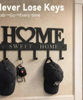 Solid Wall Mounted Key Rack With Five Heavy Duty Hooks Gonna Keep Your Daily Grind Organized Top Shelf Entryway Storage For Keys Bags And Pet Leashes Black with hats and keys.
