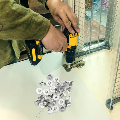 Built Tough Chicago Style Binding Screws For Books And Scrapbooks And Paper Crafts Using 75 Piece Silver Carbon Steel Fasteners with a drill and screws on a workspace.
