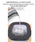 Pouring hot water into the Compact Portable Washing Machine Mini Foldable Electric Washer Dryer Combo for disinfection.