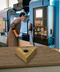 10 Pack TNMG160404R-S Carbide Turning Inserts for CNC Lathe on workshop table near CNC machine