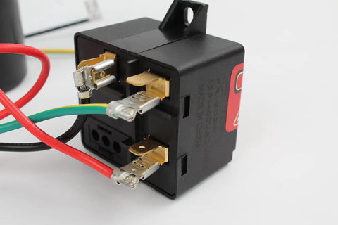 Close-up of AC Hard Start Capacitor Kit for 3 to 5 ton units with preattached wires and metal terminals.