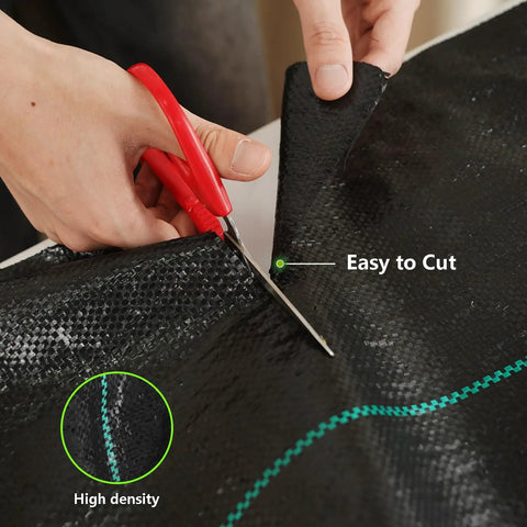 Hands using scissors to cut Heavy Duty Garden Weed Barrier Fabric 3ft By 100ft Landscape Ground Cloth With Superior Permeability