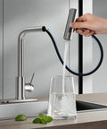 Big Time Upgrade Pull Down Kitchen Sink Faucet Featuring Four High Pressure Spray Modes In Durable Brushed Nickel and Reliable Waterfall Flow filling a glass.