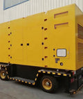 Heavy Duty Container Generator Set Delivering Ultra Rock Solid Backup Electricity For Industrial Power Stations On Large Scale Construction And Commercial Job Sites, yellow portable unit.