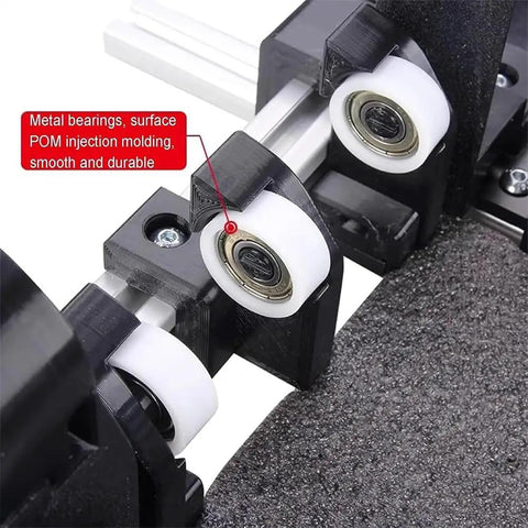 Close-up of metal bearings and POM molded wheels on Super Adjustable Manual Box Folding Aid For Shipping Cardboard Containers Hassle Free Easy Pack Tool.