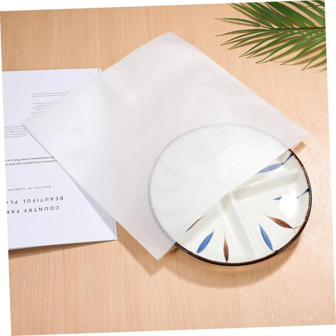 120 Pcs EPE Foam Packing Pouches Super Durable Soft Cushion Bags For Secure Shipping To Keep Your Small Fragile Setup Cell Phones And Gears Safe And Sound With Smooth Inner Lining Always Ready To Roll, covering a plate on a wooden table.
