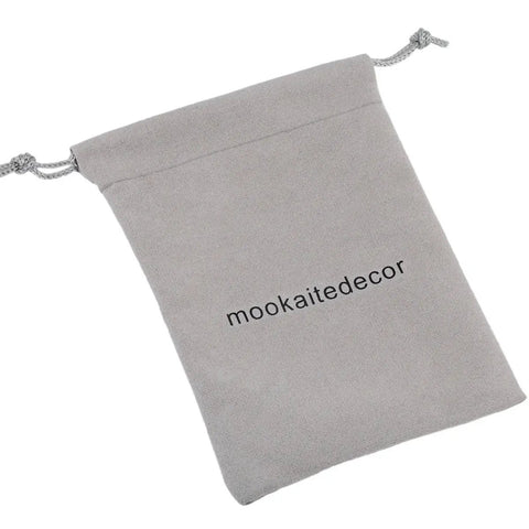Gray drawstring pouch with logo 'mookaitedecor', perfect for storing agate drawer knobs or small accessories.
