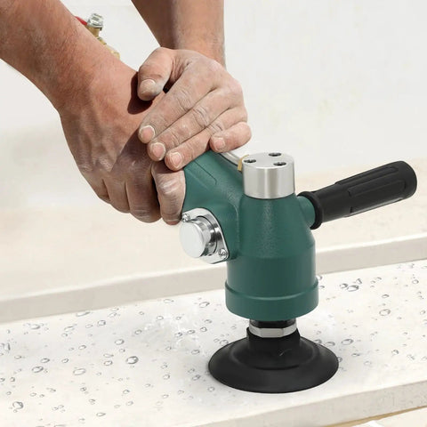 Heavy Duty Pneumatic Angle Grinder With Variable Speed And Tank Build For Stainless Steel Polishing And Granite Shaping No Fuss Hookup One Quarter Inch Air Inlet Daily Driver Shop Workhorse Tool in use smoothing granite.