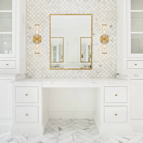 Gold Wall Sconce Lights Two Pack With Candle Shaped Glass Shades Brushed Brass Mid Century Vanity Wall Lamps in elegant bathroom setting