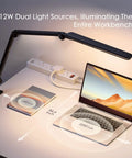 Lit LED Desk Lamp With Clamp And Remote Control illuminating a desk with a laptop and book, flexible swing arm, dual light modes