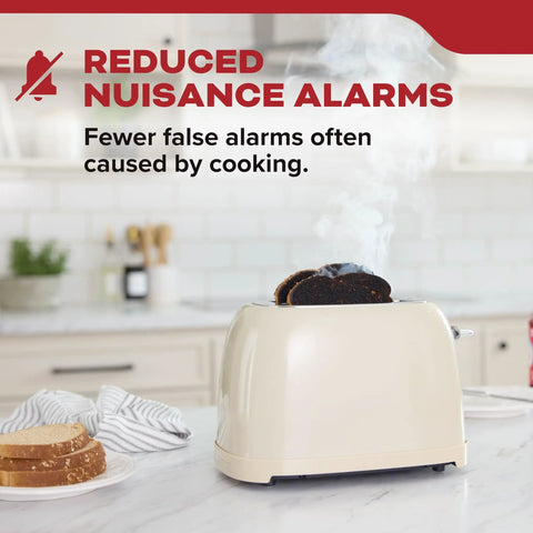 Hardwired Smoke Detector With Aa Battery Backup And 120V Ac Power Two Pack Delivering Quick Smoke Alerts And A Crisp 85 Decibel Alarm Straight Up Solid Home Guardian with reduced nuisance alarms in a kitchen setting.