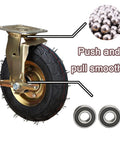 Heavy Duty Pneumatic Swivel Caster Set With Side Brake And Shock Absorbing Wheels For Industrial Toolboxes close-up of caster wheel with air-filled tire.