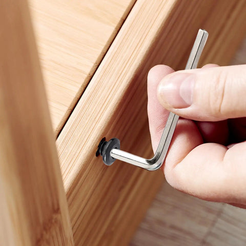 Person using Allen tool on Rock Solid 1/4 20 X 1 Flat Head Hex Socket Cap Screws for assembly or repair.